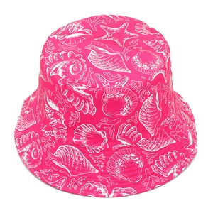 Detailed top view of rose pink bucket hat with white starfish and shell ocean prints