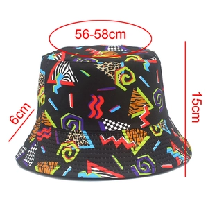 Detailed view of reversible bucket hat with dimensions 56-58cm head circumference
