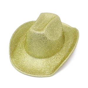Detail view of the shimmering gold glitter texture on a classic western cowboy hat