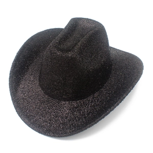 Close-up of black western cowboy hat with sparkling sequin finish and wide brim