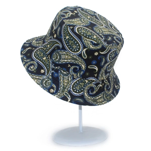 Detail of navy blue paisley bucket hat featuring premium cotton canvas texture