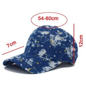 Detailed view of tie-dye star and moon baseball cap with 54-60cm adjustable circumference
