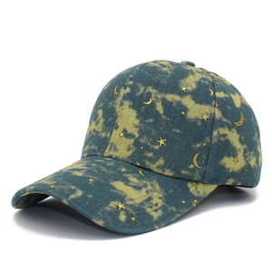 Tie-dye baseball cap with gold star and moon embroidery in blue and yellow denim style