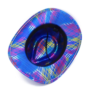 Close-up of holographic rainbow grid texture and interior tag on a blue cowboy hat