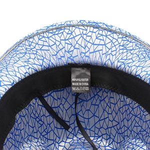 Macro detail of the inner sweatband and polyester care label on the sequin cowboy hat