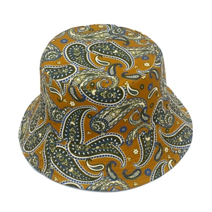 Detail of tan paisley bucket hat with reinforced stitching and vintage pattern design