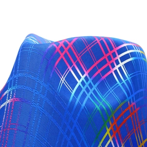 Detailed view of colorful rainbow stripe texture on dark blue fabric cowboy hat