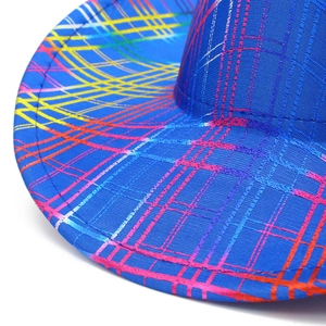 Detail of colorful gradient striped fabric and clean stitching on a cowboy hat