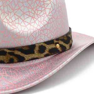 Detail view of pink sequin party hat with leopard print band and golden stud accent