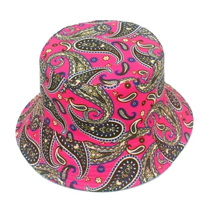 Detail view of pink bucket hat with blue paisley print on durable polyester fabric