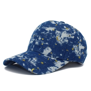 Tie-dye baseball cap with gold star and moon embroidery in dark blue and white denim