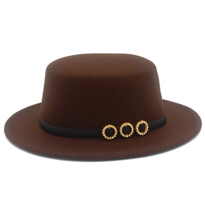 Close-up of the dark brown felt flat-top hat featuring rhinestone gold rings on the belt