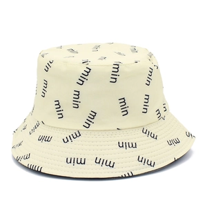 Minimalist cream bucket hat with black min letter print and reinforced stitched brim