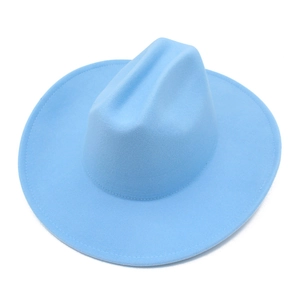 Vue de dessus d'un chapeau de cowboy en feutre de laine bleu clair avec calotte creuse