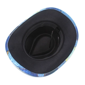 Close-up of vintage tie-dye fedora interior showing material tag and blue art pattern