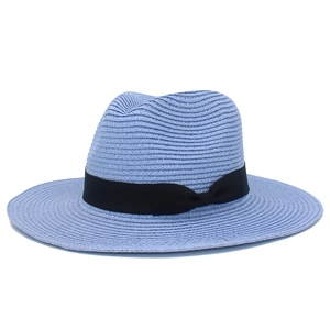 Light blue woven straw sun hat with black ribbon and bow for outdoor beach wear