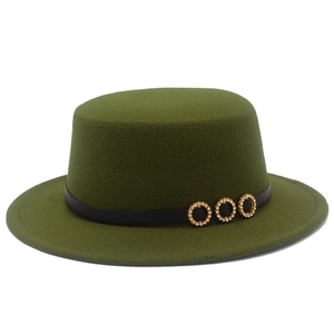 Close-up of olive green wool felt flat top hat featuring black leather band and crystal rings
