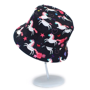 Kids black bucket hat featuring colorful unicorn, flamingo and floral prints