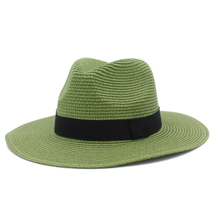 Detail of avocado green straw fedora hat featuring a classic black grosgrain ribbon band