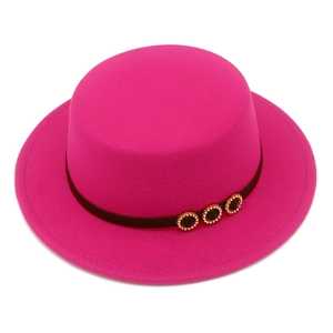 Detail of rose pink flat top felt hat with brown thin band and diamond buckles