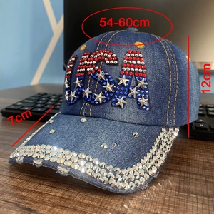 Detail of USA rhinestone lettering and sparkling crystal trim on denim baseball cap
