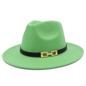 Detail of green wool fedora hat featuring black leather band and gold buckle