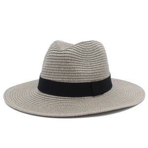 Detail view of the fine straw weave and black ribbon on this summer fedora sun hat