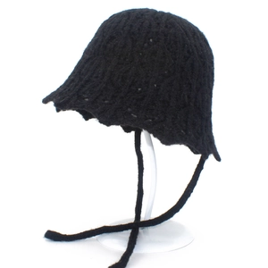 Sweet black knitted bucket hat with woven straps and textured wool finish for women