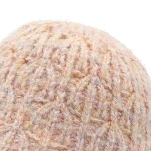 Close-up of multicolor mixed knit texture with warm fleece finish for winter hat
