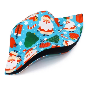 Close-up of blue Christmas bucket hat with Santa, snowman, and snowflake patterns