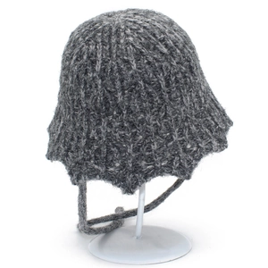 Detail view of the thick knit texture and tie-up earflaps on the dark grey bucket hat