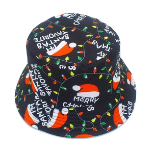 Detailed top view of black Christmas bucket hat with festive Santa and light bulb patterns