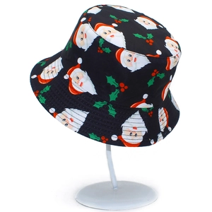 Close-up of black bucket hat featuring Santa Claus and holly berry festive pattern
