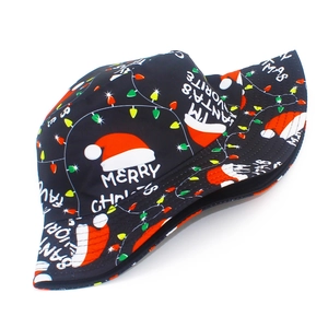 Detailed view of black bucket hat with colorful Christmas motifs and festive phrases