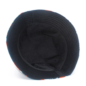 Close-up of the black cotton lining and durable stitching inside a Christmas bucket hat