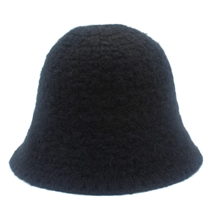 Minimalist black knitted bucket hat for women crafted in warm textured crochet wool
