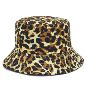 Close-up of leopard print bucket hat showing dense stitching and canvas fabric texture