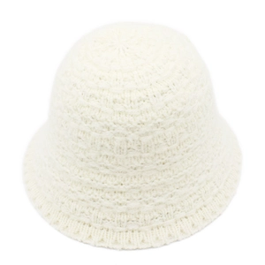 Close-up of beige knitted bucket hat showing detailed textured mesh wool pattern