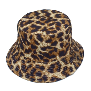 Detail of double-sided leopard print bucket hat showing fabric texture and stitched brim