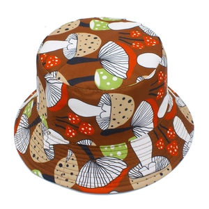 Detailed view of colorful mushroom print on dark brown cotton bucket hat with clean stitching