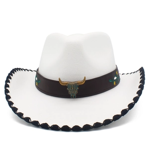 Detail of white felt cowboy hat with embroidered leather band and bull skull metal ornament