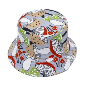 Close-up of gray bucket hat featuring colorful mushroom pattern and durable stitching