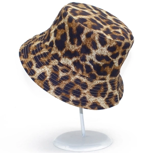Detailed view of leopard print bucket hat showing fabric texture and parallel stitching