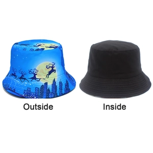 Dual-sided bucket hat featuring reversible Christmas reindeer print and solid black side