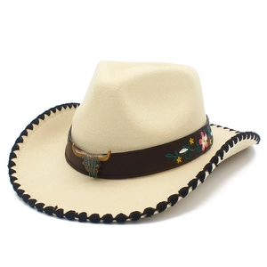 Beige Western cowboy hat with bull head ornament and ethnic embroidery on dark leather band
