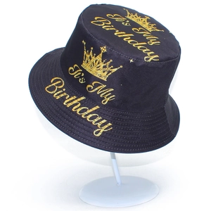 Reversible birthday bucket hat with gold crown and It's My Birthday print on black cotton
