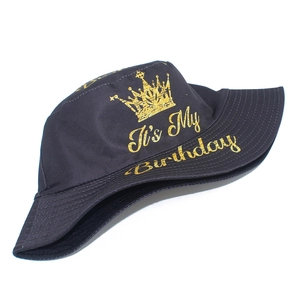 Reversible birthday bucket hat with gold crown and It's My Birthday text in black cotton