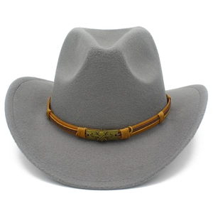 Detail of grey wool jazz hat with vintage bronze skull metal buckle on brown strap