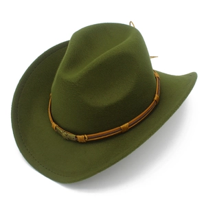 Detailed view of olive green felt cowboy hat with vintage bronze buckle and brown leather band