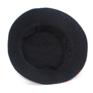 Foldable outdoor bucket hat with Santa Claus patterns showing inner black fabric lining